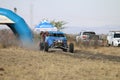 Speeding blue Zarco rally car at start of race Royalty Free Stock Photo